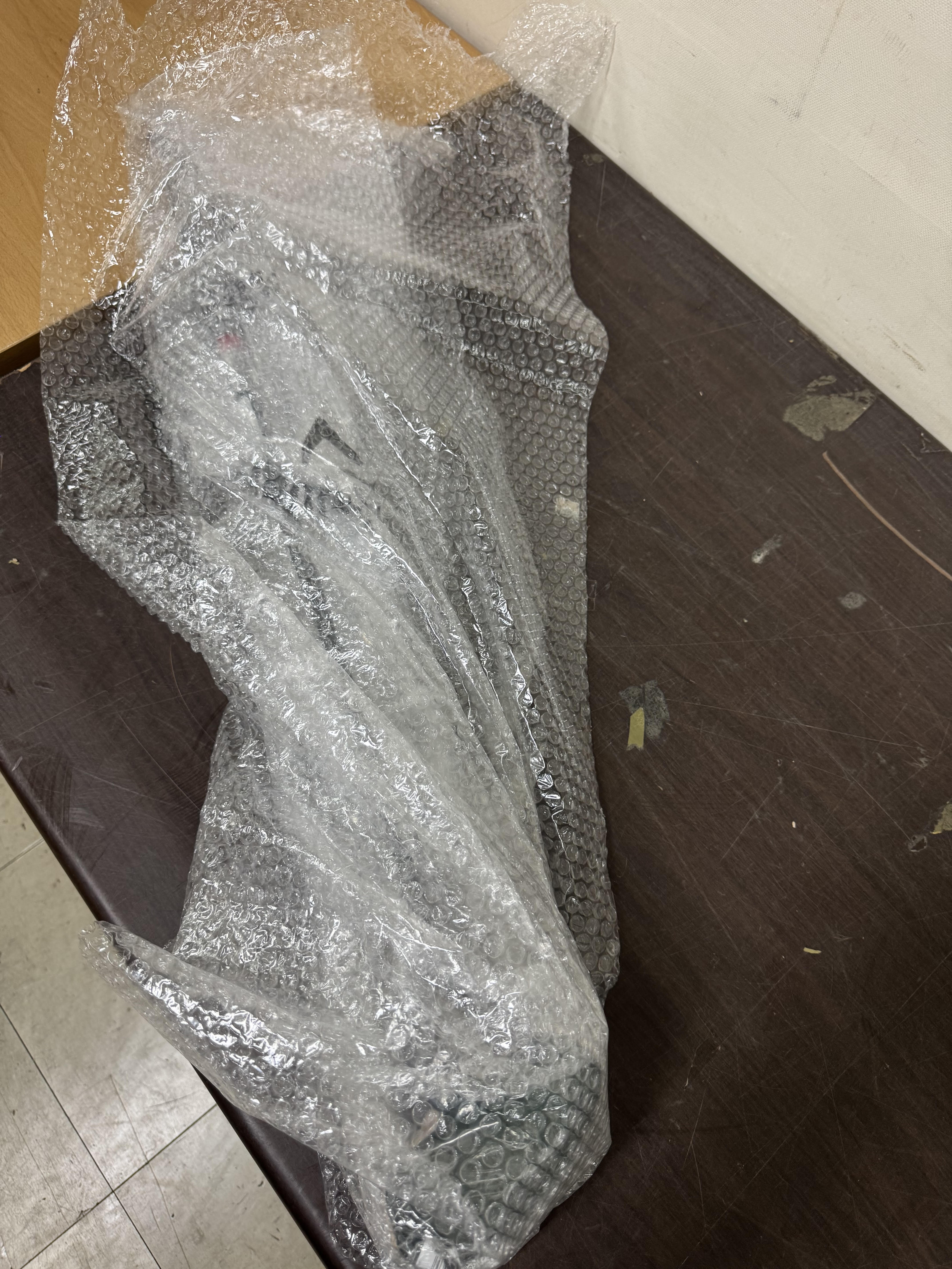 Putter wrapped in bubble wrap