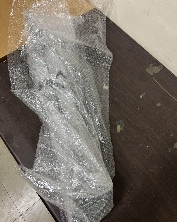 The putter wrapped in several layers of bubble wrap